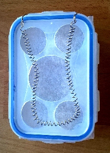Spiralformung über den Deckelöffnungen